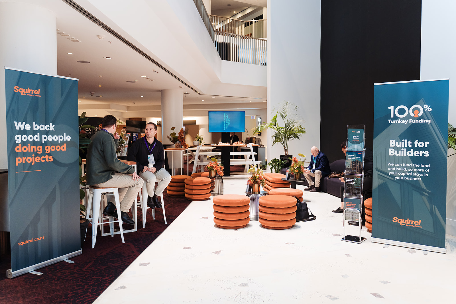 Squirrel and 100% Turnkey Funding pull-up banners at the Constructive Conference venue
